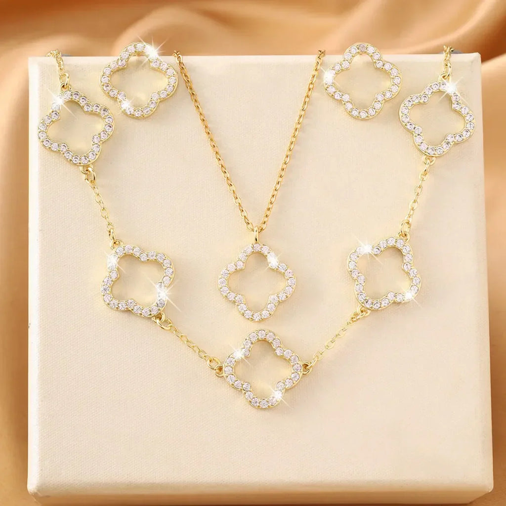 Wunderschönes Set - Ohrringe, Armband und Halskette mit filigranen Glitzer - Blumen