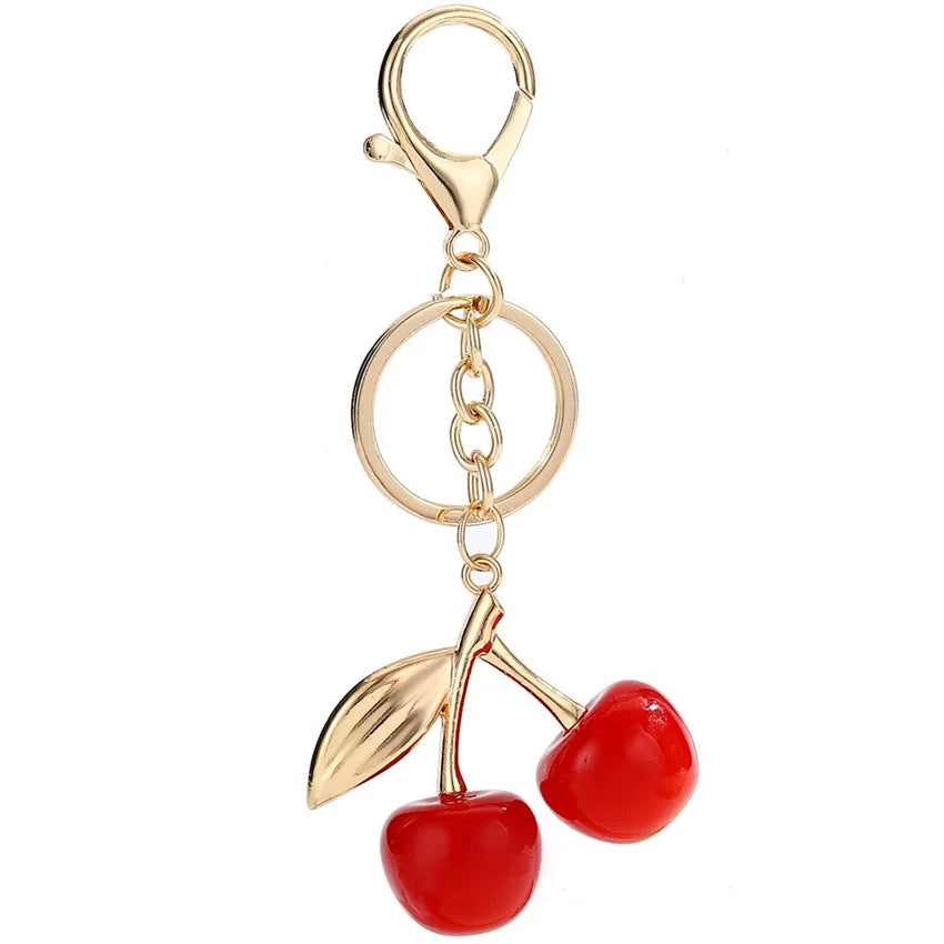 Niedlicher Taschenanhänger, Accessoire in Gold mit Kirsch - Anhänger