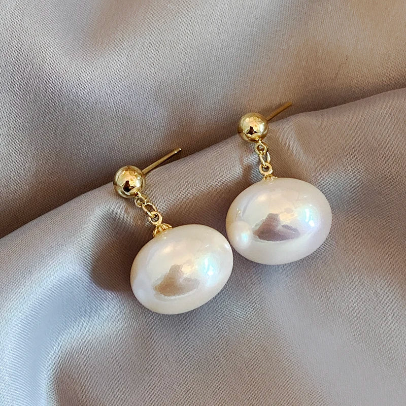 Elegante Perlenohrringe, verschiedene Modelle