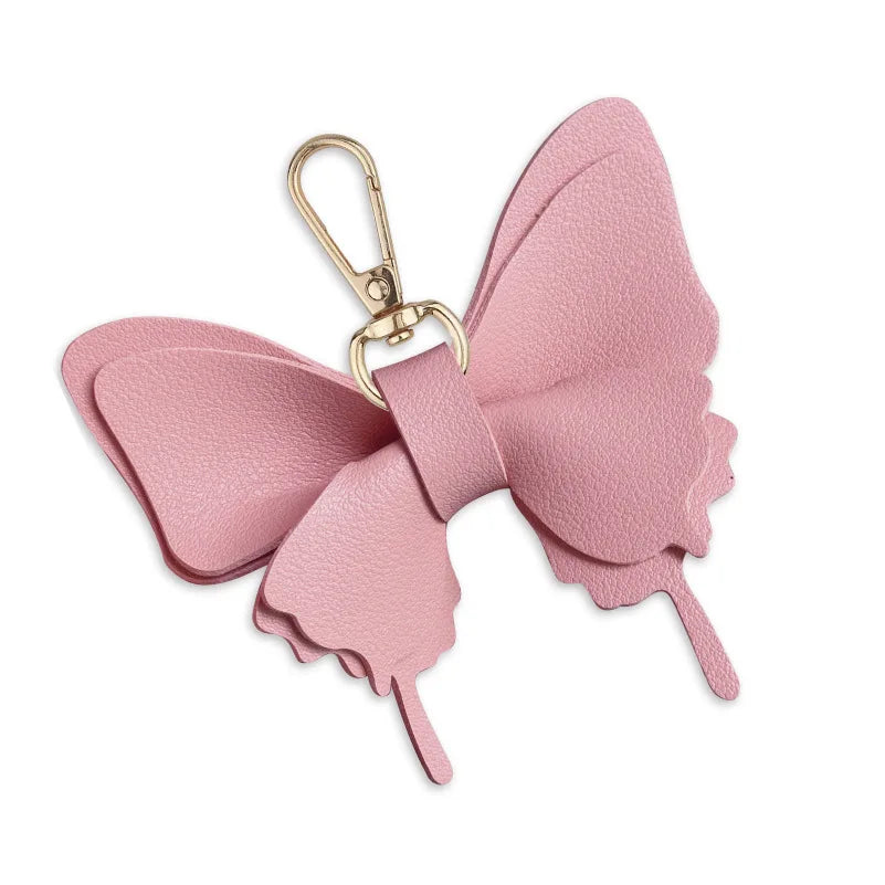 Niedlicher Taschenanhänger, Schlüsselanhänger in Gold mit Schmetterling-Anhänger