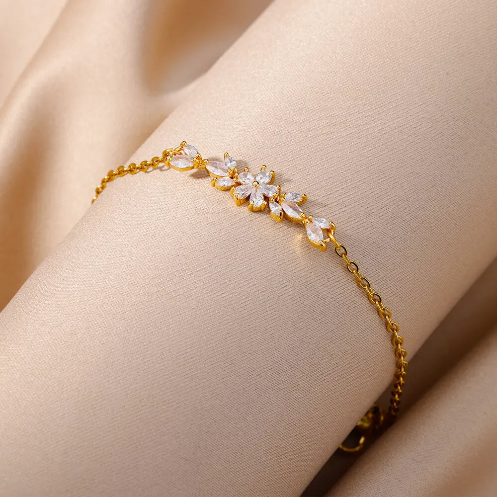 Elegante Armkette/ Armband in Gold und Silber mit Blumen/Steinen