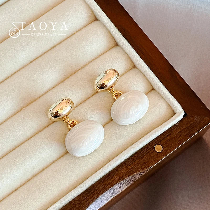 Elegante Perlenohrringe, verschiedene Modelle
