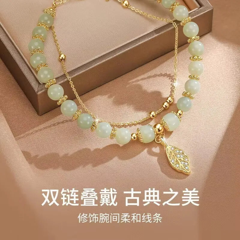 Elegante doppelreihige Armkette/ Armband in Gold, mit Perlen in Mint