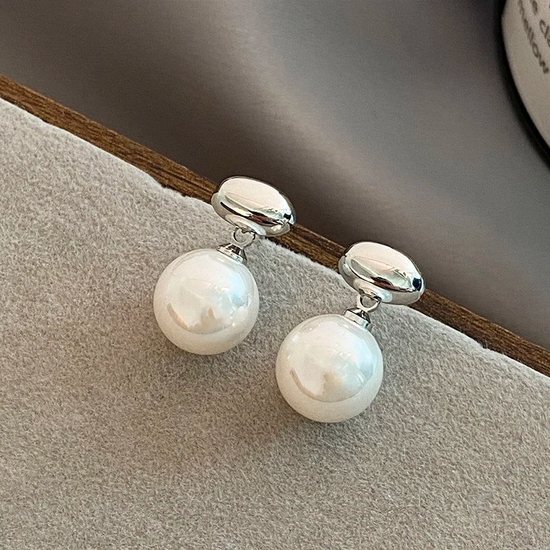 Elegante Perlenohrringe, verschiedene Modelle
