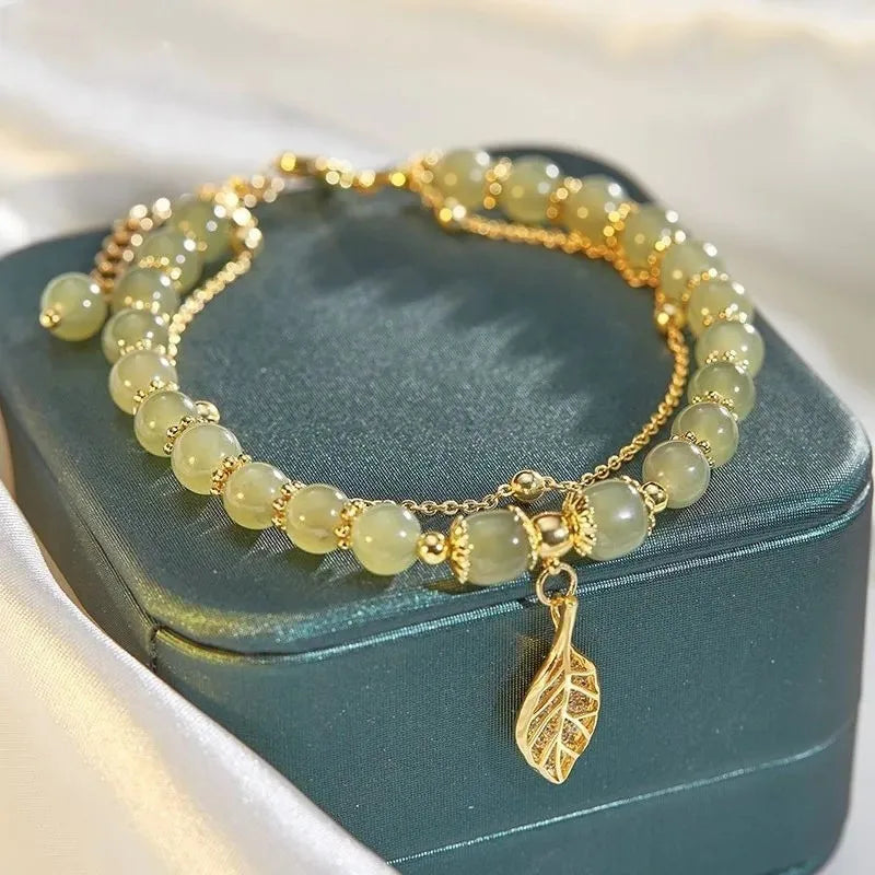 Elegante doppelreihige Armkette/ Armband in Gold, mit Perlen in Mint