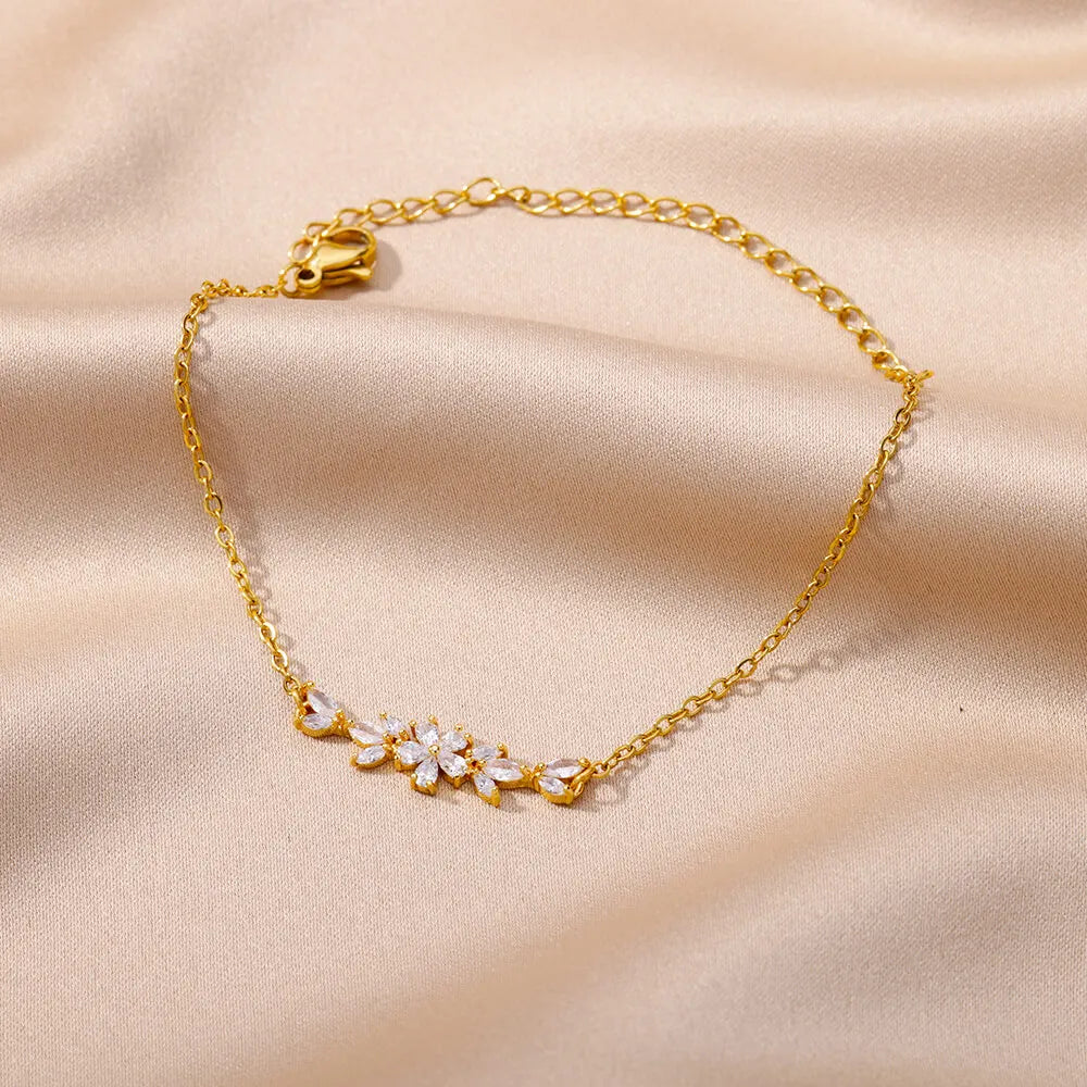 Elegante Armkette/ Armband in Gold und Silber mit Blumen/Steinen