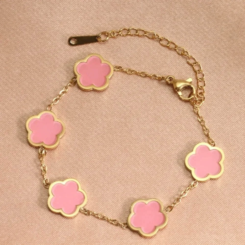 Elegante Armkette/ Armband in Gold, mit verschiedenfarbigen Blumen