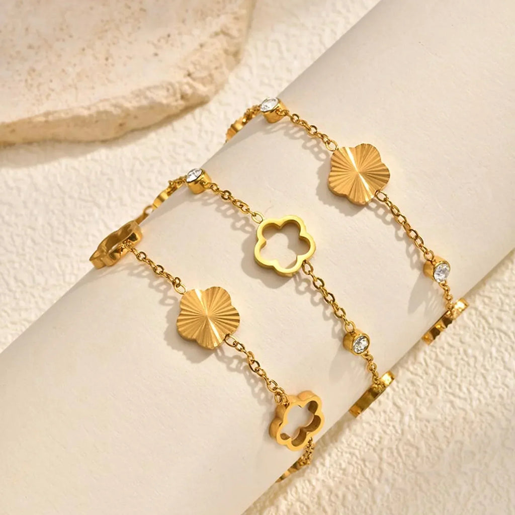Elegante Armkette/ Armband in Gold, mit verschiedenen Motiven