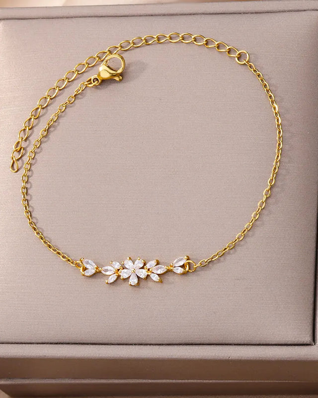 Elegante Armkette/ Armband in Gold und Silber mit Blumen/Steinen