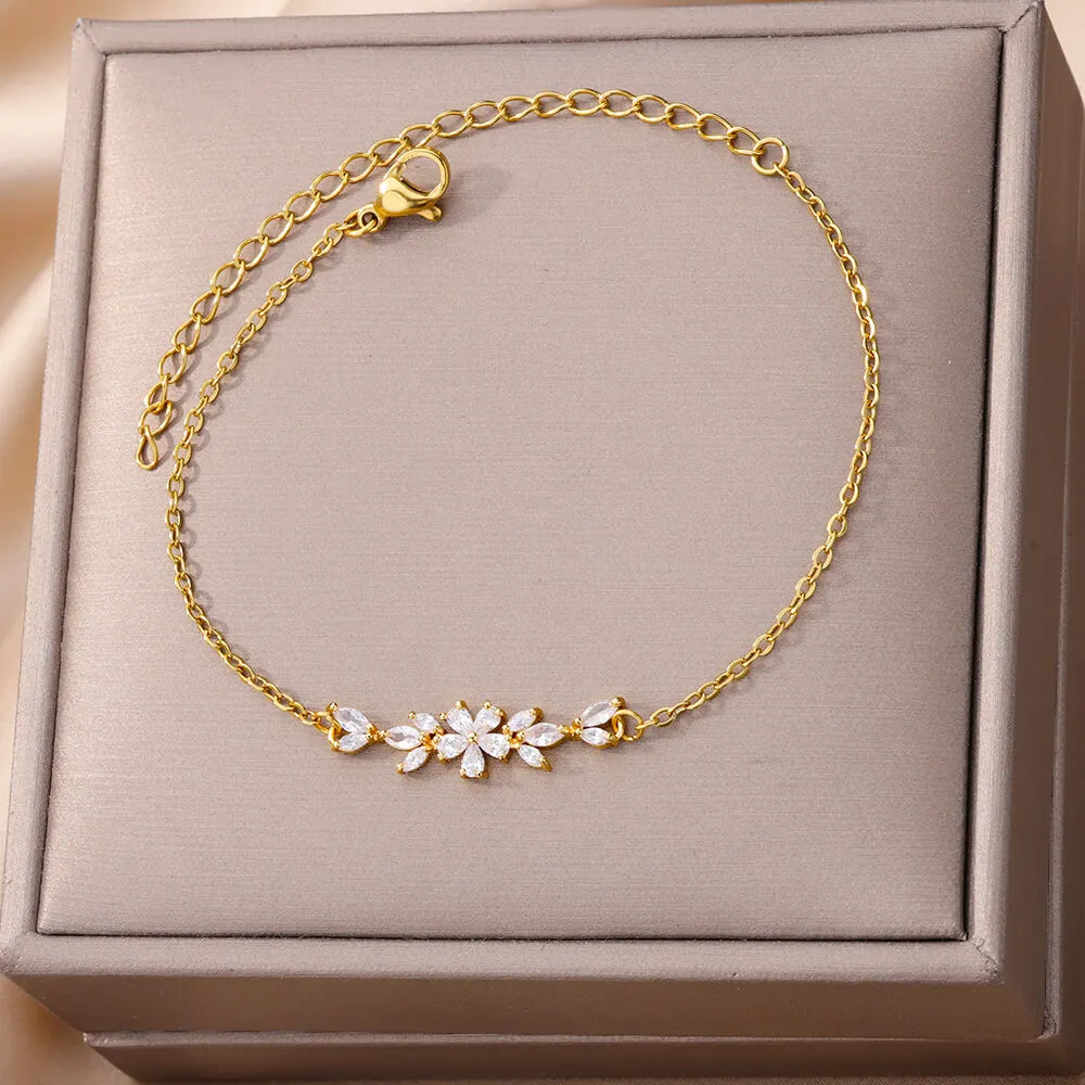Elegante Armkette/ Armband in Gold und Silber mit Blumen/Steinen