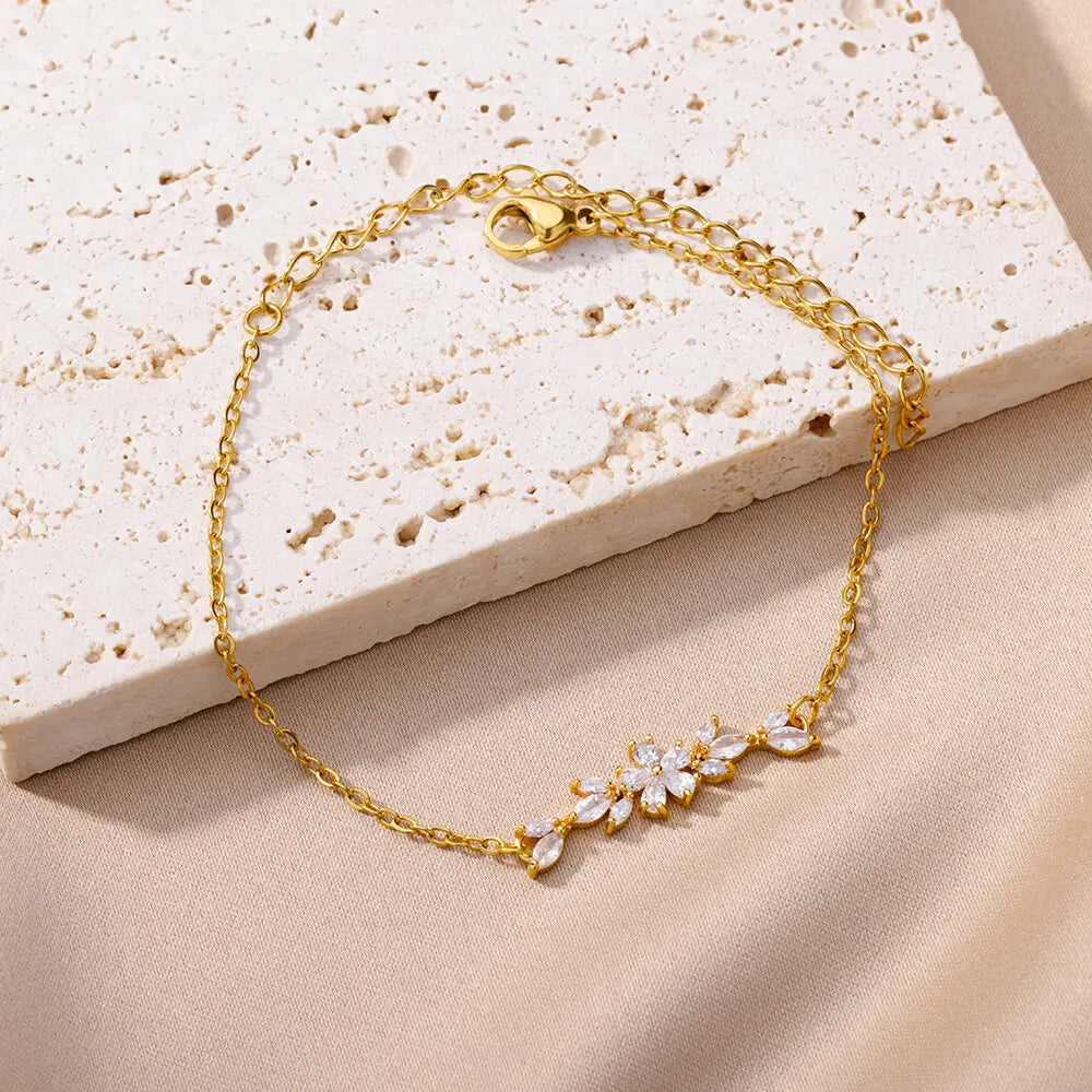 Elegante Armkette/ Armband in Gold und Silber mit Blumen/Steinen
