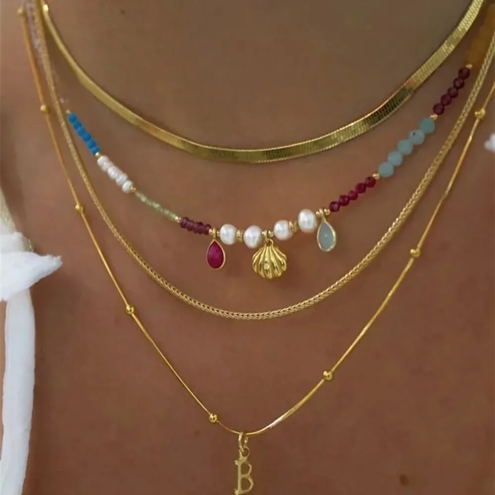 Boho Halsketten mit verschiedenen Anhängern in Gold