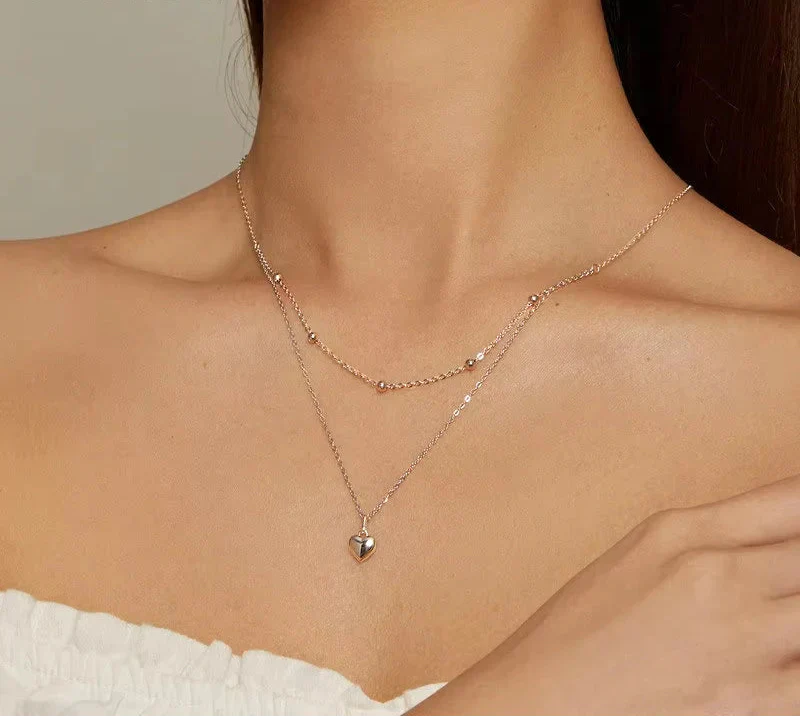 Elegante doppelreihige Halsketten mit kleinem Herz-Motiv