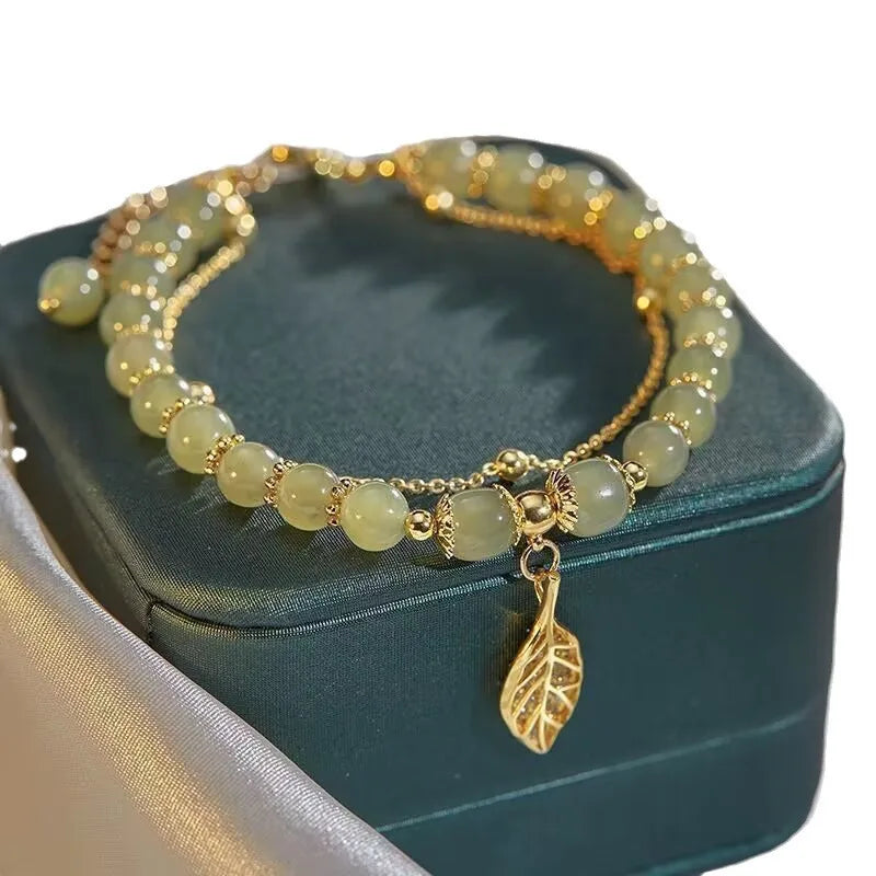 Elegante doppelreihige Armkette/ Armband in Gold, mit Perlen in Mint