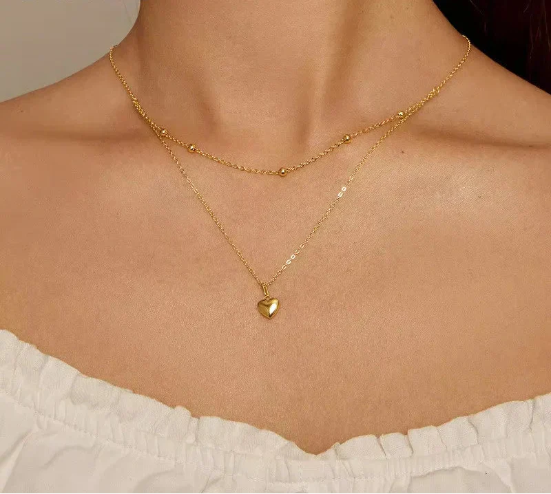 Elegante doppelreihige Halsketten mit kleinem Herz-Motiv