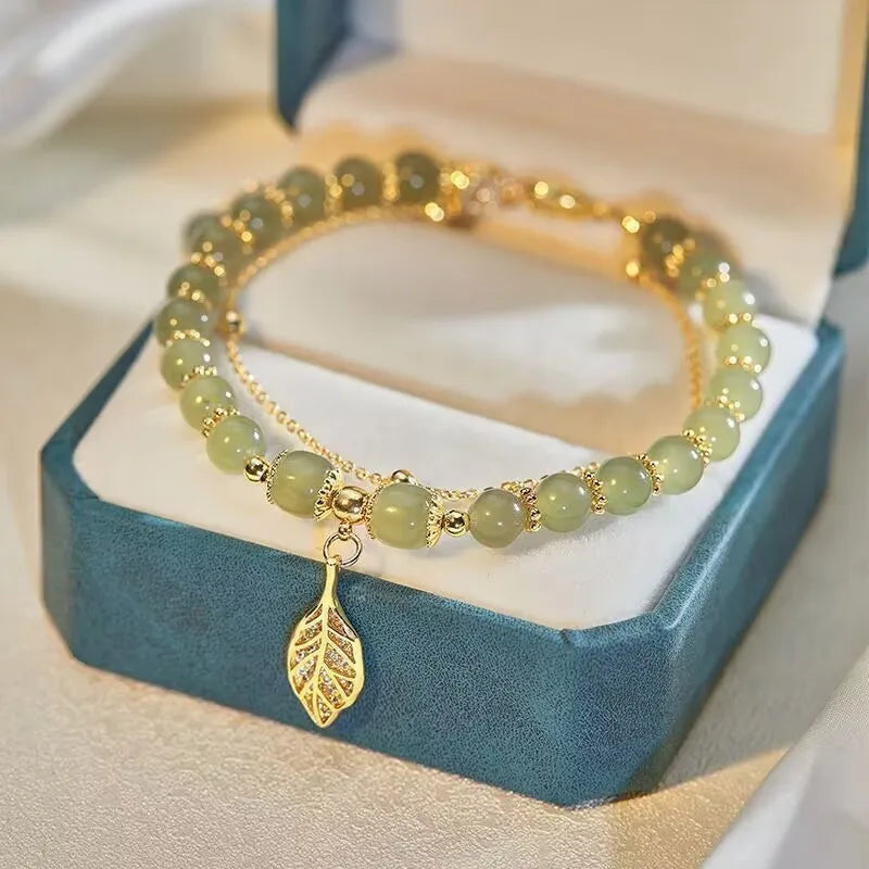 Elegante doppelreihige Armkette/ Armband in Gold, mit Perlen in Mint