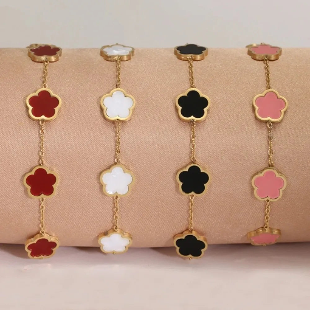 Elegante Armkette/ Armband in Gold, mit verschiedenfarbigen Blumen