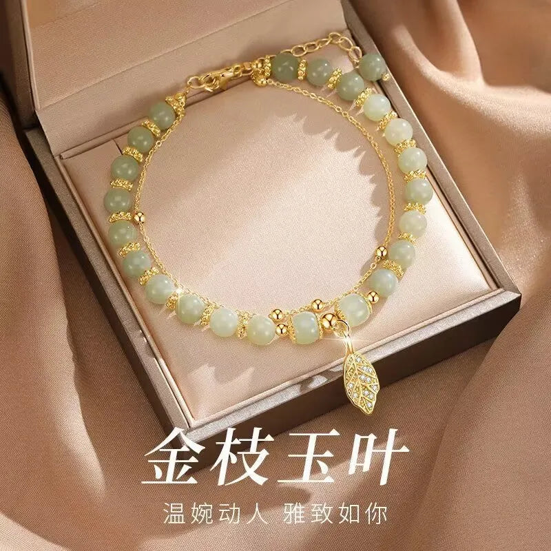 Elegante doppelreihige Armkette/ Armband in Gold, mit Perlen in Mint