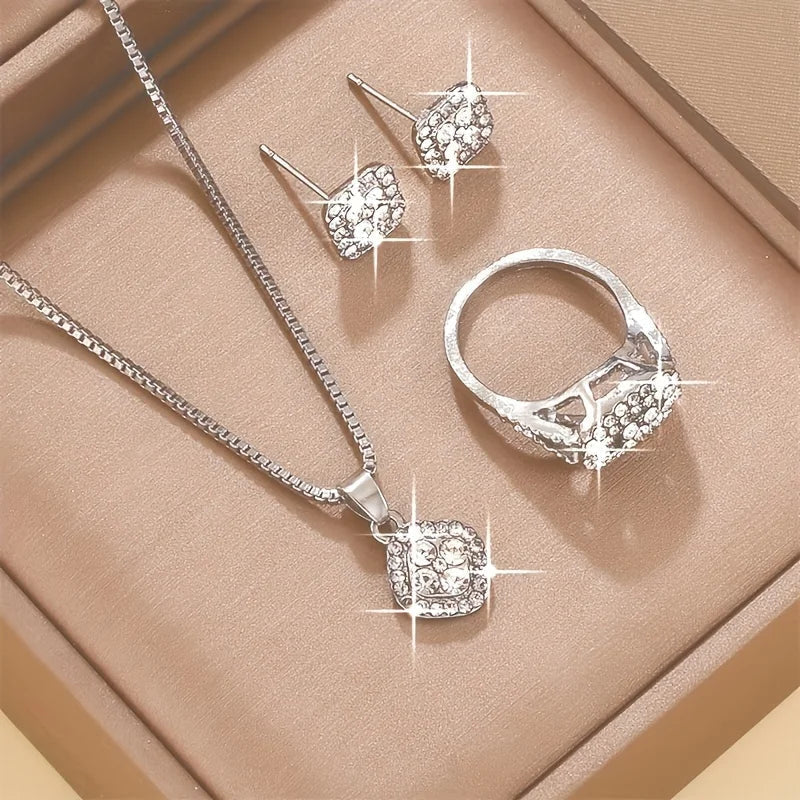Set mit Halskette, Ring und passenden Ohrringe, mit funkelnden Steinen