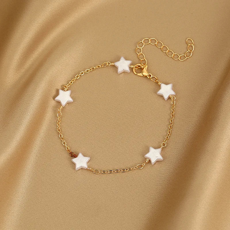 Elegante Armkette/ Armband mit Steinen und Perlen, verschiedene Modelle